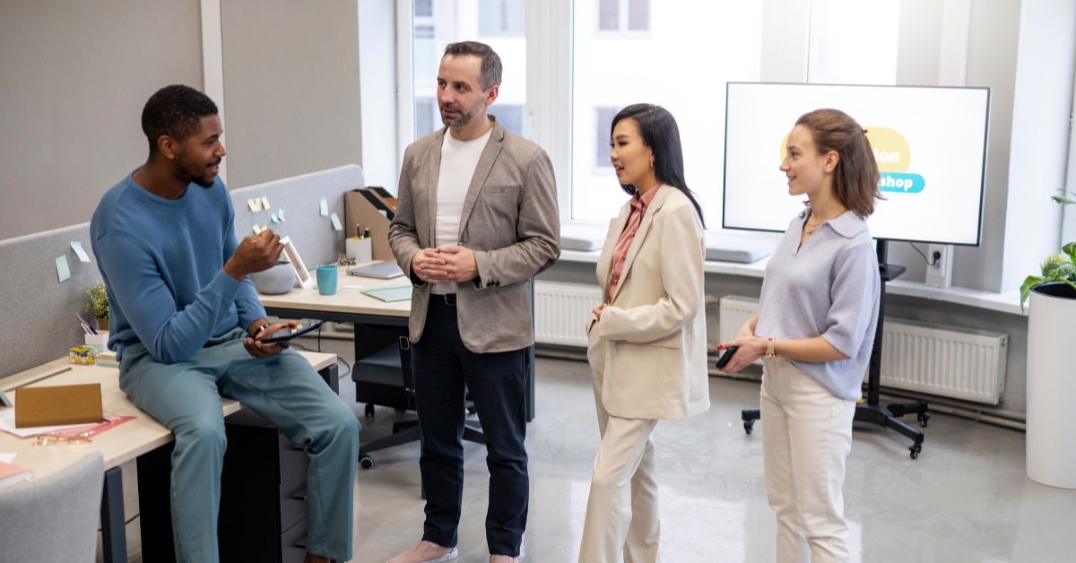 Team collaborating on talent acquisition strategies during an HR consulting session.