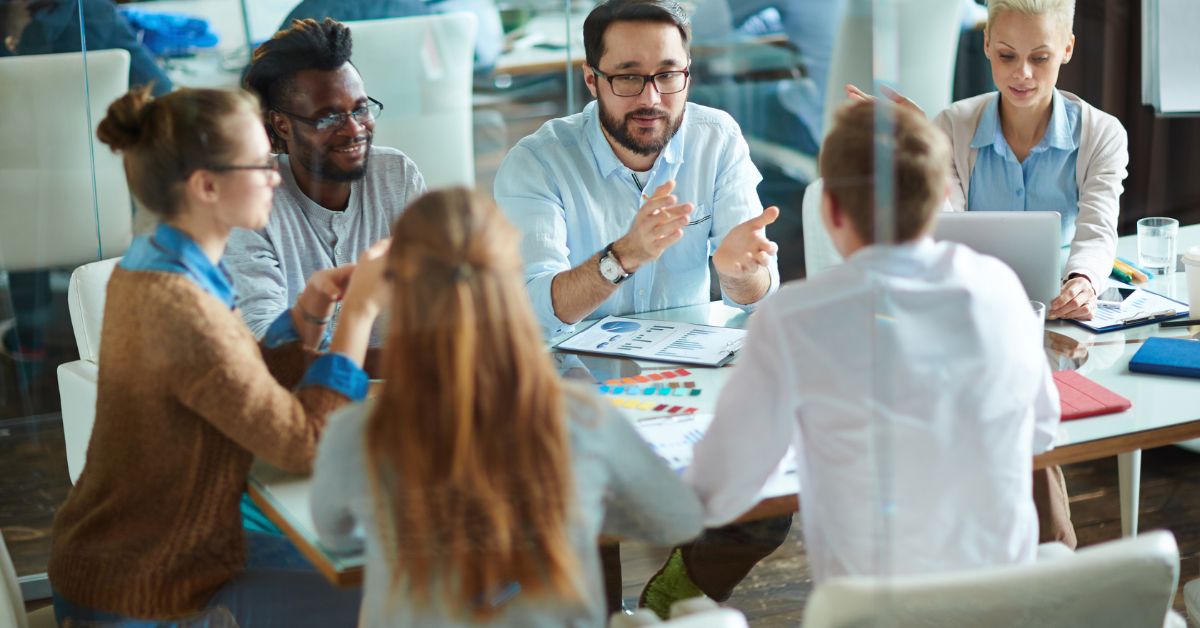 Team discussing HR compliance strategies during a collaborative HR consulting session.